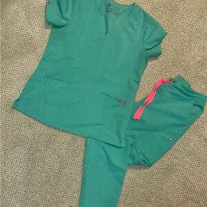 FIGS surgical green with bright pink accent scrub set